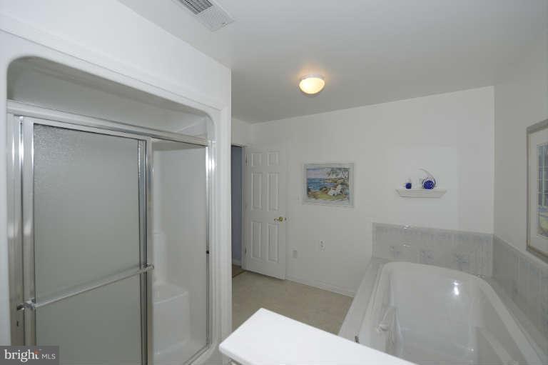 1408 Clearview Road Edgewood, MD 21040 - Photo 14 of 26 a bathroom with a bathtub and toilet