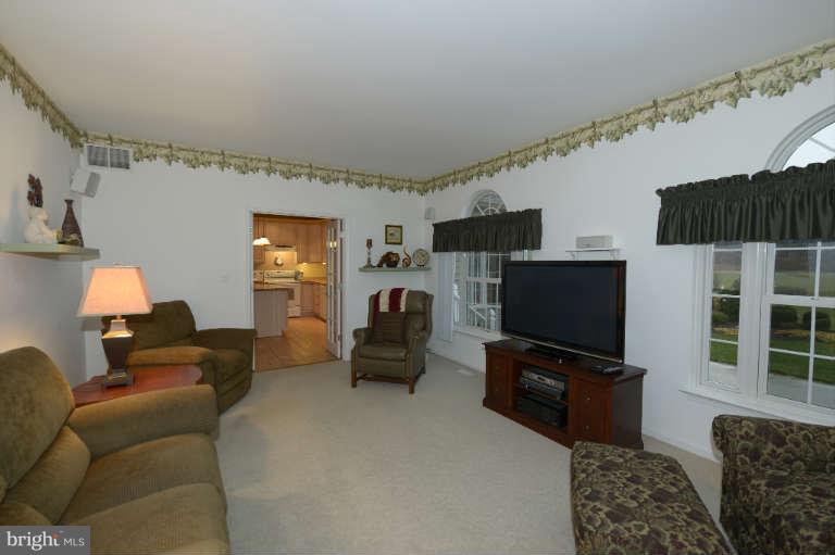 1408 Clearview Road Edgewood, MD 21040 - Photo 9 of 26 a living room with furniture and a flat screen tv