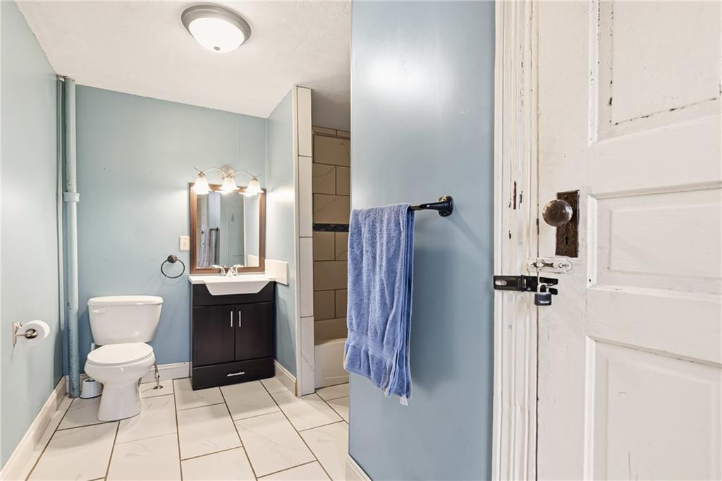 126 Welsh Hill Road Friedens, PA 15541 - Photo 16 of 31 a bathroom with a sink toilet and shower