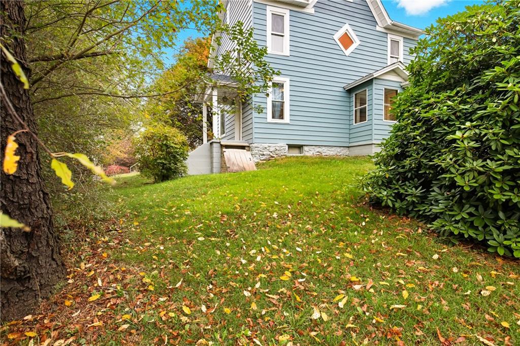 126 Welsh Hill Road Friedens, PA 15541 - Photo 27 of 31 a view of a house with a yard