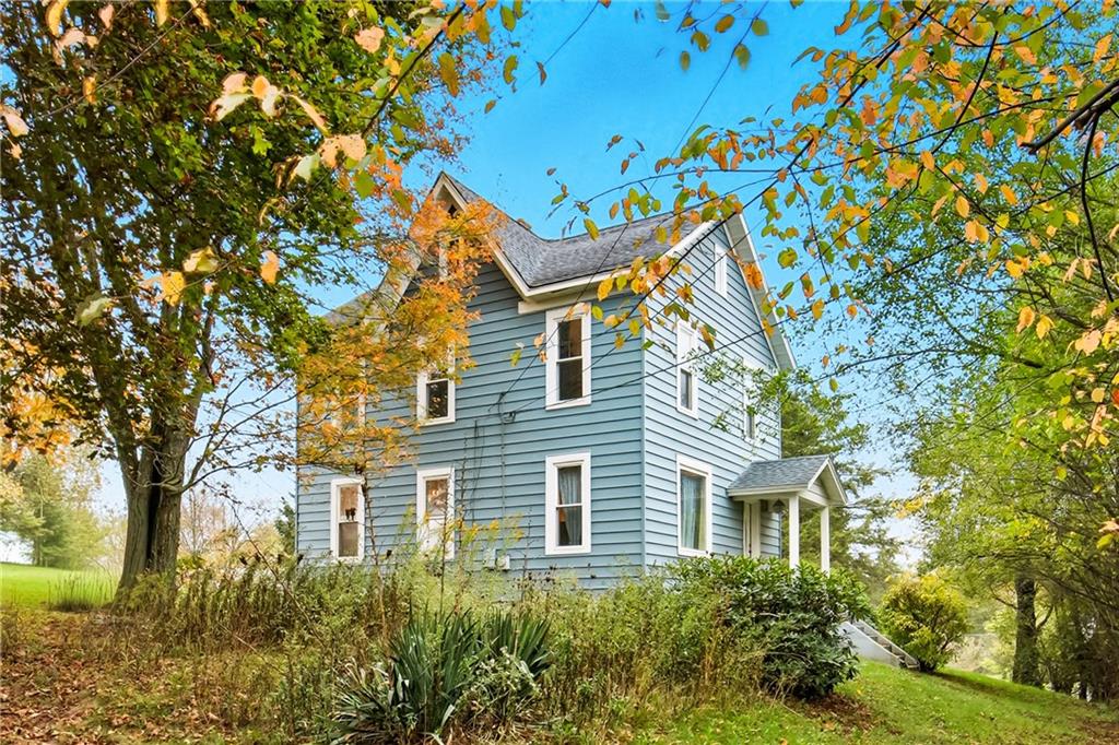 126 Welsh Hill Road Friedens, PA 15541 - Photo 31 of 31 a front view of a house with a tree