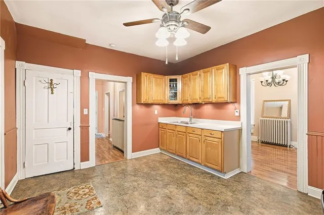 a kitchen with stainless steel appliances granite countertop a stove cabinets and refrigerator