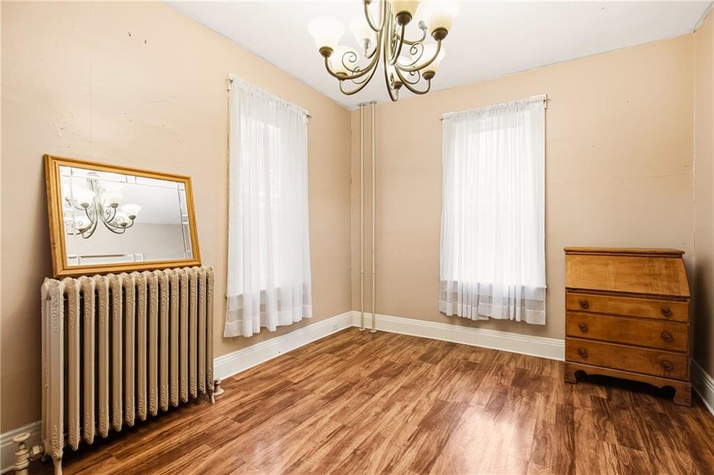 126 Welsh Hill Road Friedens, PA 15541 - Photo 6 of 31 a view of empty room with wooden floor