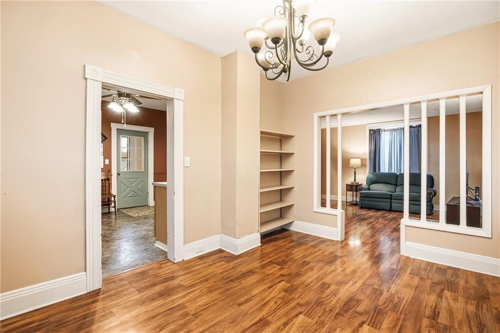 126 Welsh Hill Road Friedens, PA 15541 - Photo 7 of 31 a view of a room with wooden floor and window