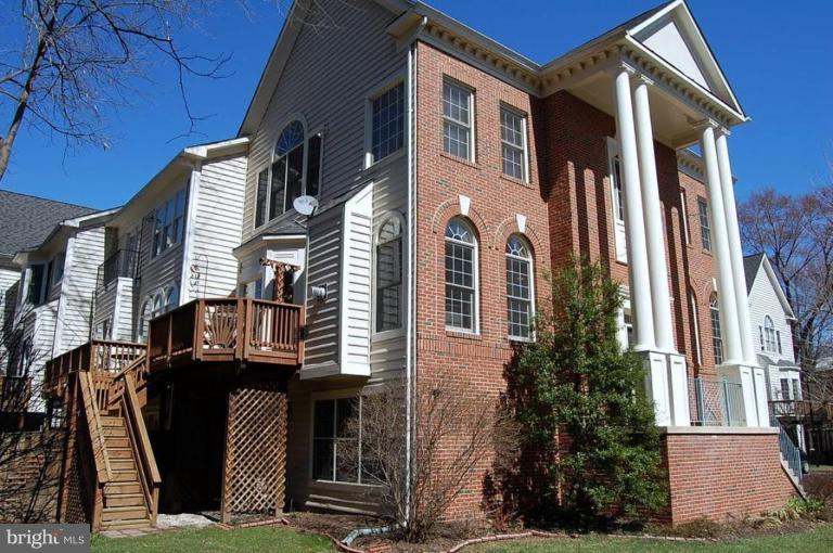 154 Rees Place Falls Church, VA 22046 - Photo 1 of 21 a front view of a house