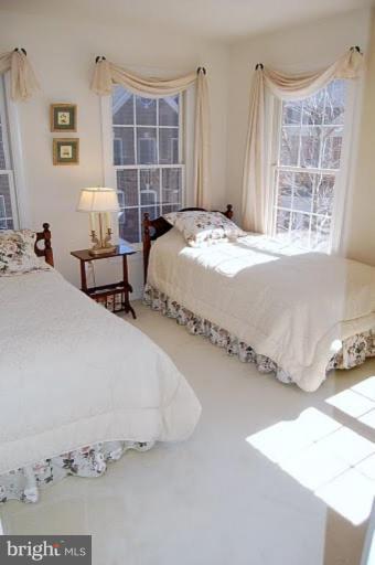 154 Rees Place Falls Church, VA 22046 - Photo 17 of 21 a bedroom with a bed and a window