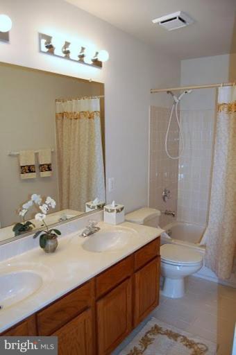 154 Rees Place Falls Church, VA 22046 - Photo 18 of 21 a bathroom with a sink a toilet and shower