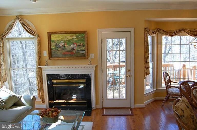 154 Rees Place Falls Church, VA 22046 - Photo 9 of 21 a living room with furniture and a fireplace
