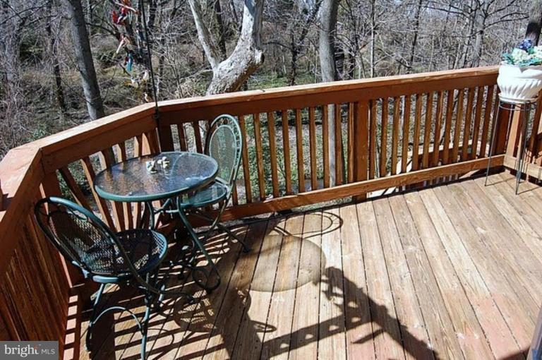 154 Rees Place Falls Church, VA 22046 - Photo 10 of 21 a view of a balcony with wooden floor