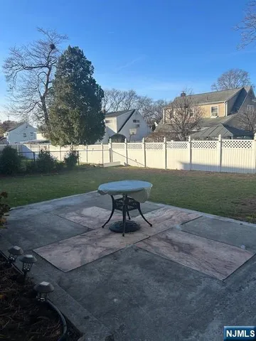a bench sitting in middle of a field