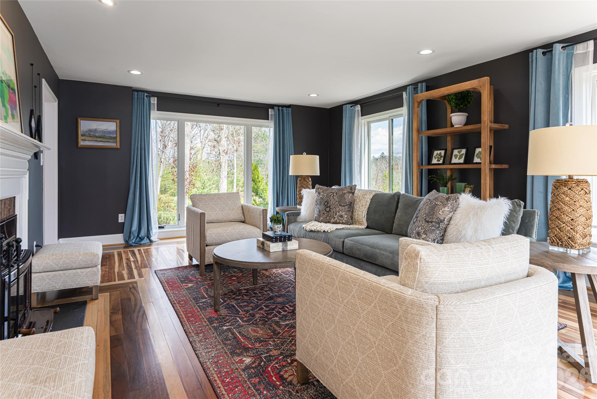 210 Wildflower Road Asheville, NC 28804 - Photo 12 of 46 a living room with furniture and a window