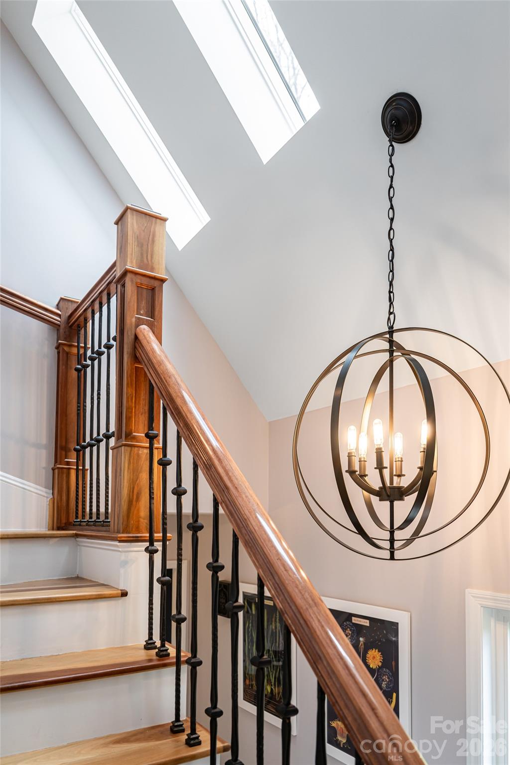 210 Wildflower Road Asheville, NC 28804 - Photo 31 of 46 a view of staircase with railing and a chandelier