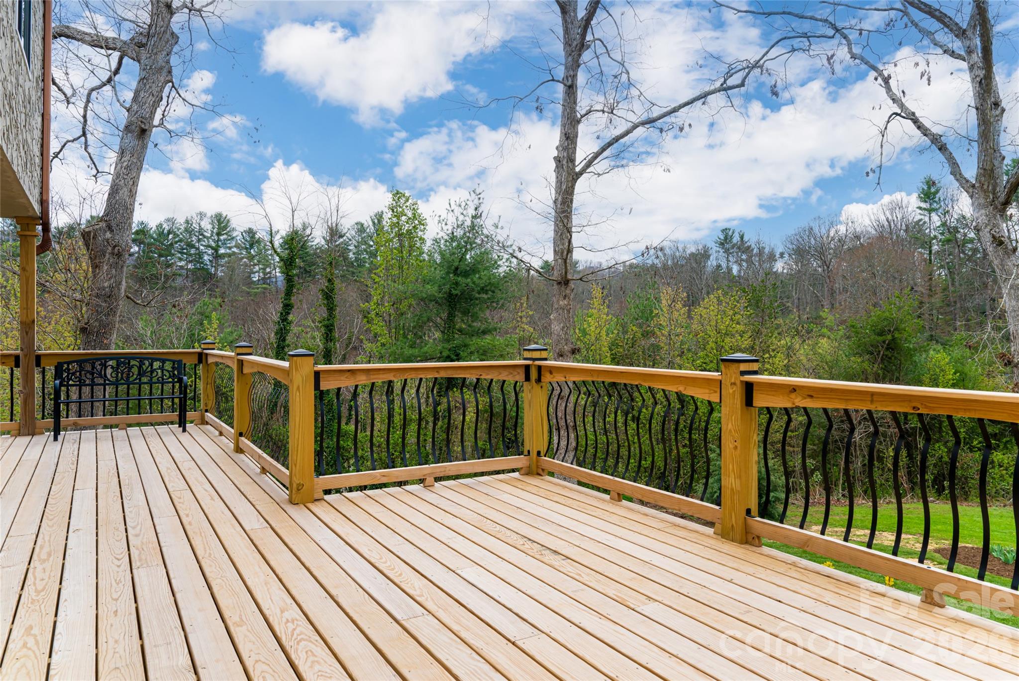 210 Wildflower Road Asheville, NC 28804 - Photo 41 of 46 a view of balcony with wooden floor and fence
