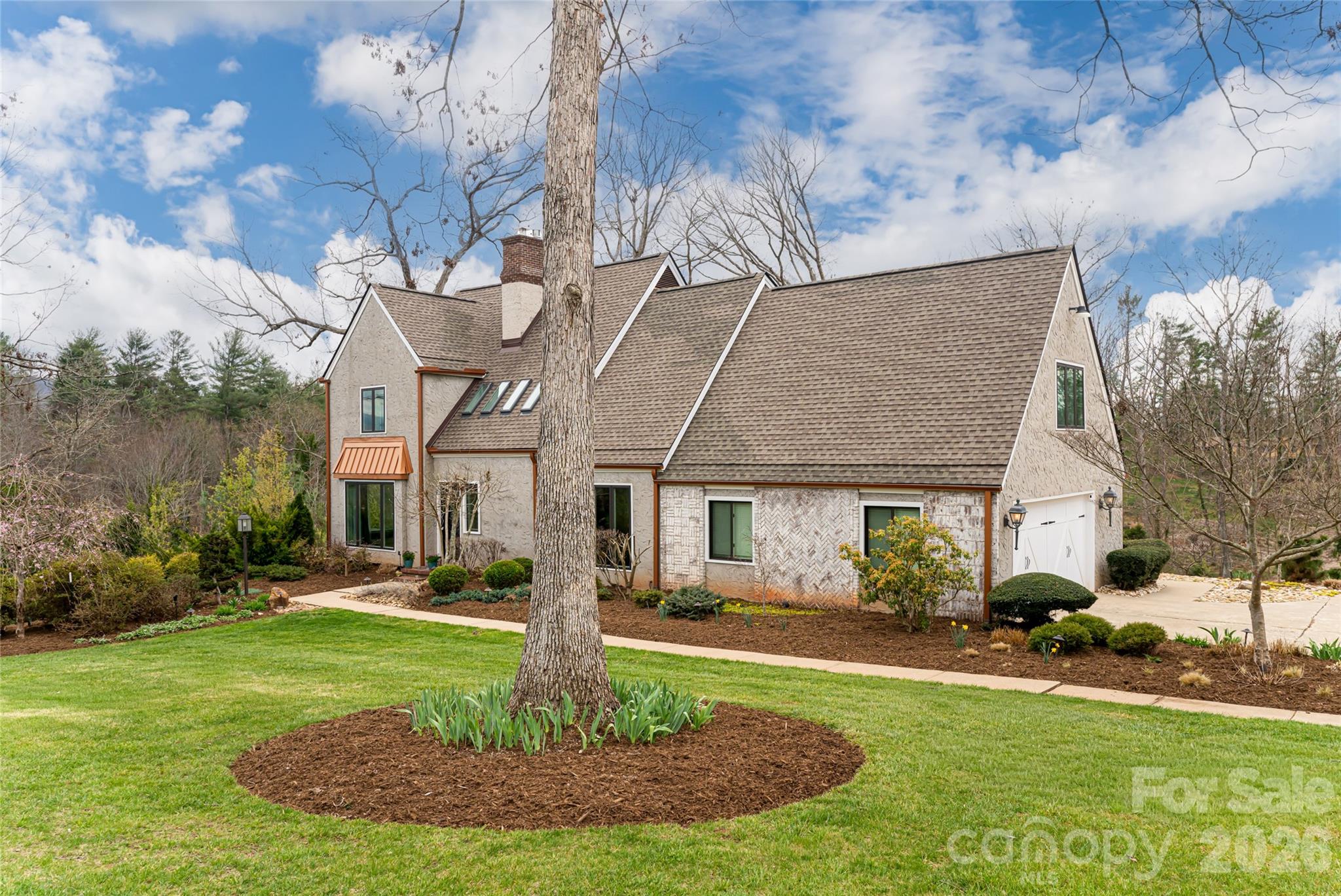 210 Wildflower Road Asheville, NC 28804 - Photo 44 of 46 a front view of a house with a yard