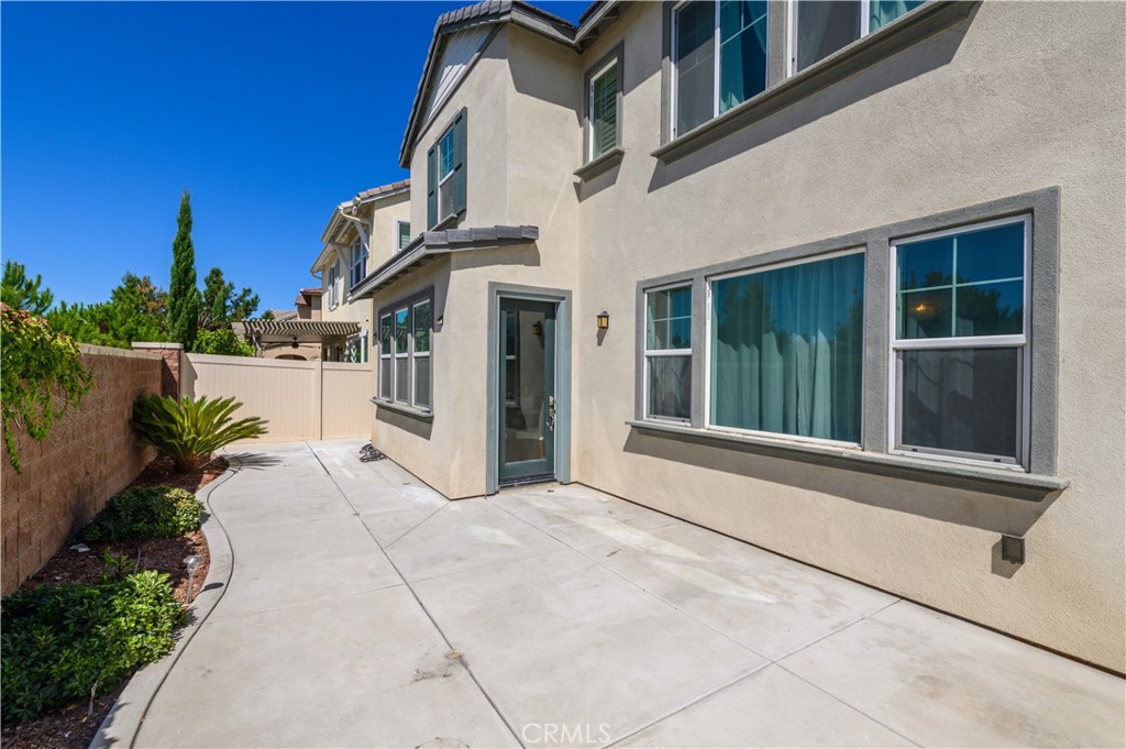 8825 Celebration Street Chino, CA 91708 - Photo 12 of 30 a view of a house with a balcony
