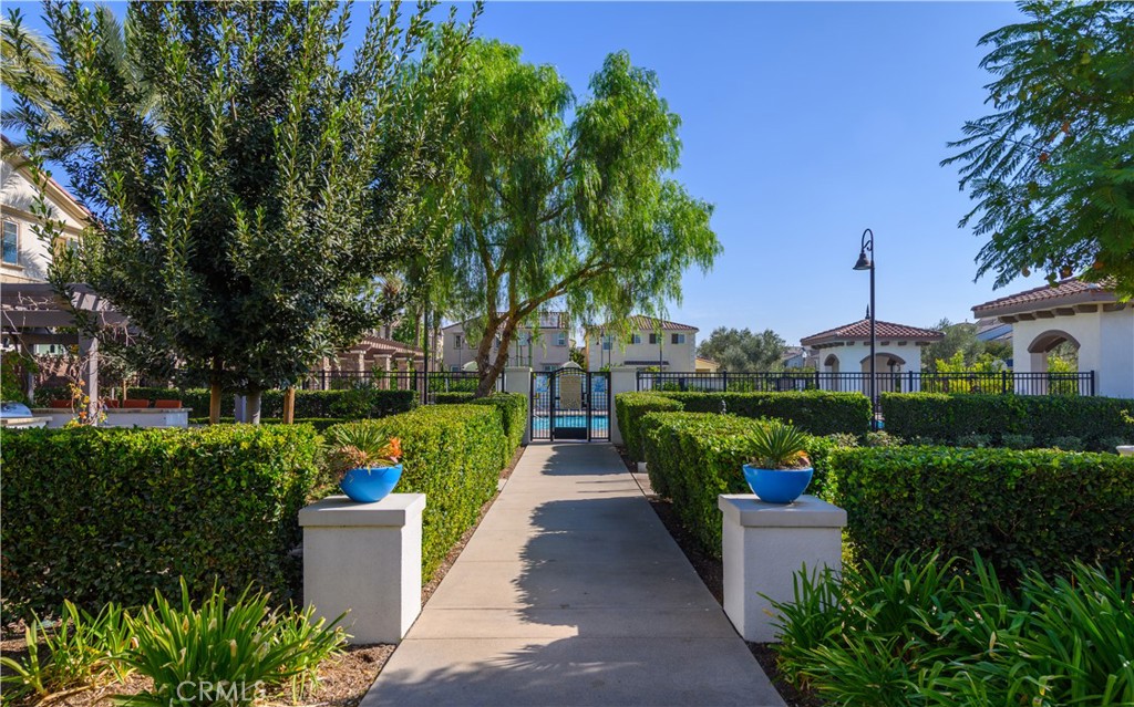 8825 Celebration Street Chino, CA 91708 - Photo 15 of 30 a view of a fountain in the garden