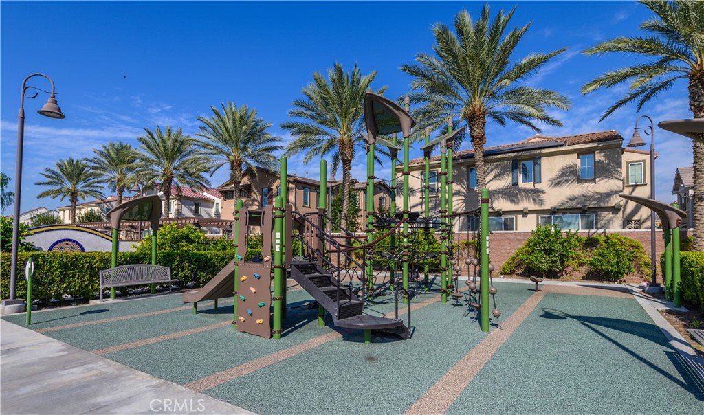 8825 Celebration Street Chino, CA 91708 - Photo 26 of 30 a view of a palm trees in front of a house