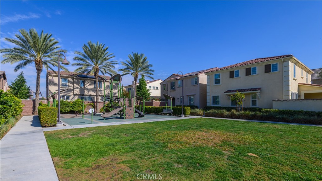 8825 Celebration Street Chino, CA 91708 - Photo 28 of 30 a front view of house with yard and green space