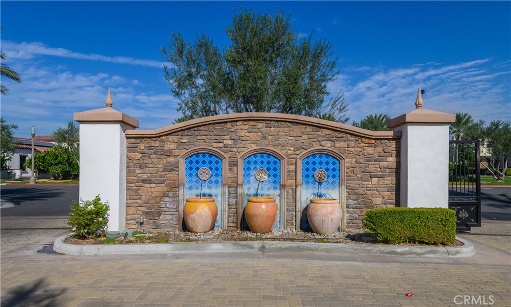 8825 Celebration Street Chino, CA 91708 - Photo 30 of 30 a front view of a house with garden