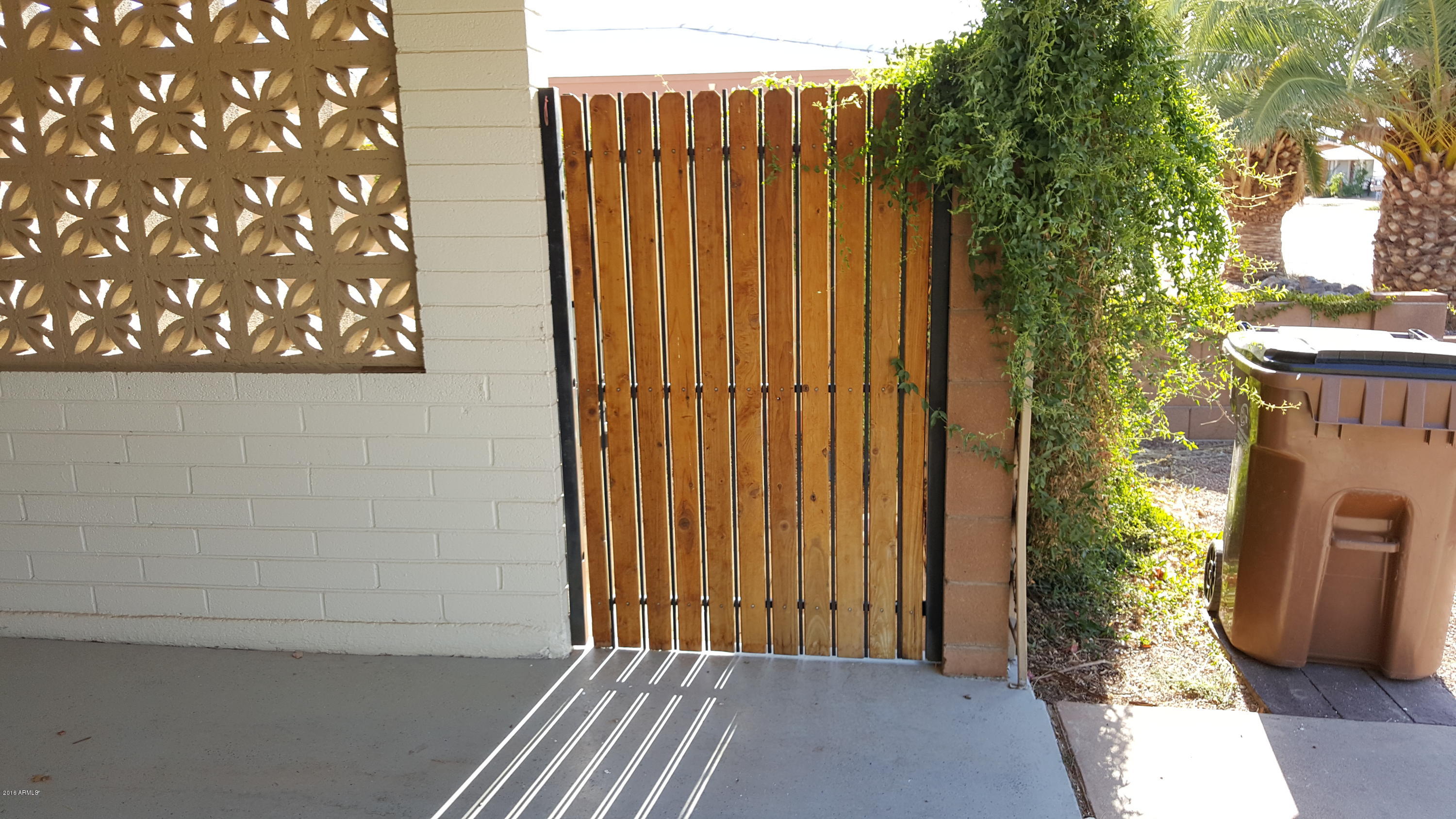 5443 Casper Road Mesa, AZ 85205 - Photo 4 of 24 Gate from Carport to Side Yard