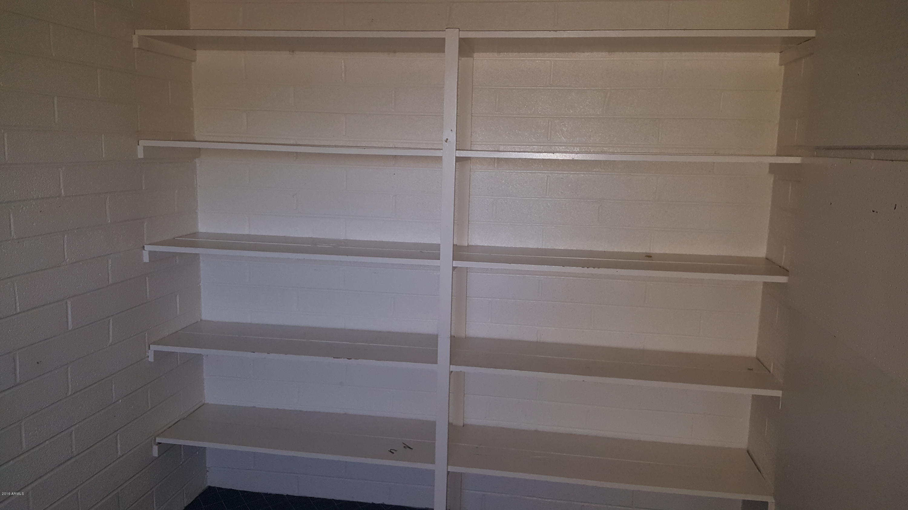 5443 Casper Road Mesa, AZ 85205 - Photo 6 of 24 Shelves in Utility Room