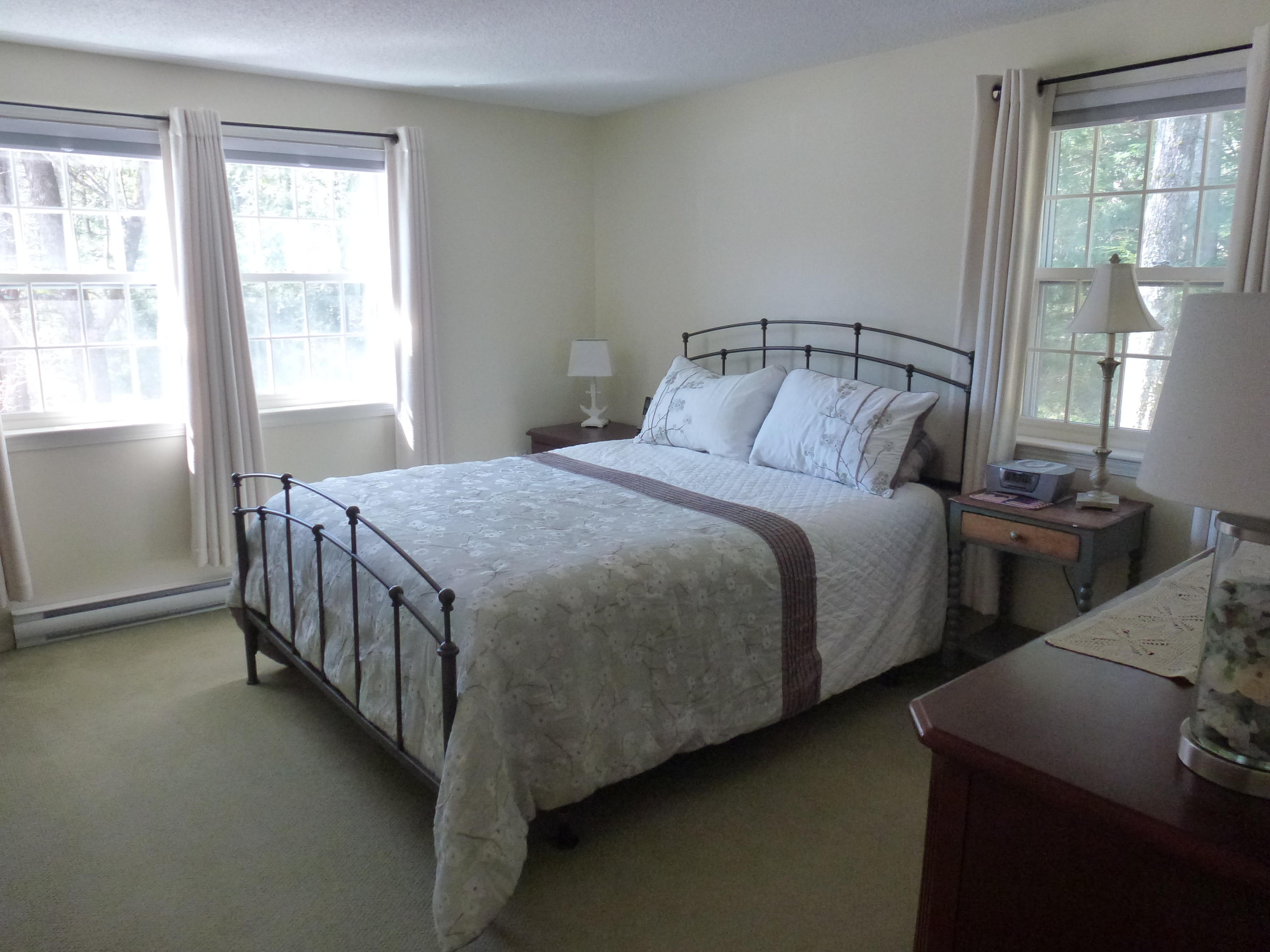 231 Flintlock Village Road, Unit 1 Wells, ME 04090 - Photo 22 of 30 1 st floor Master Bedroom