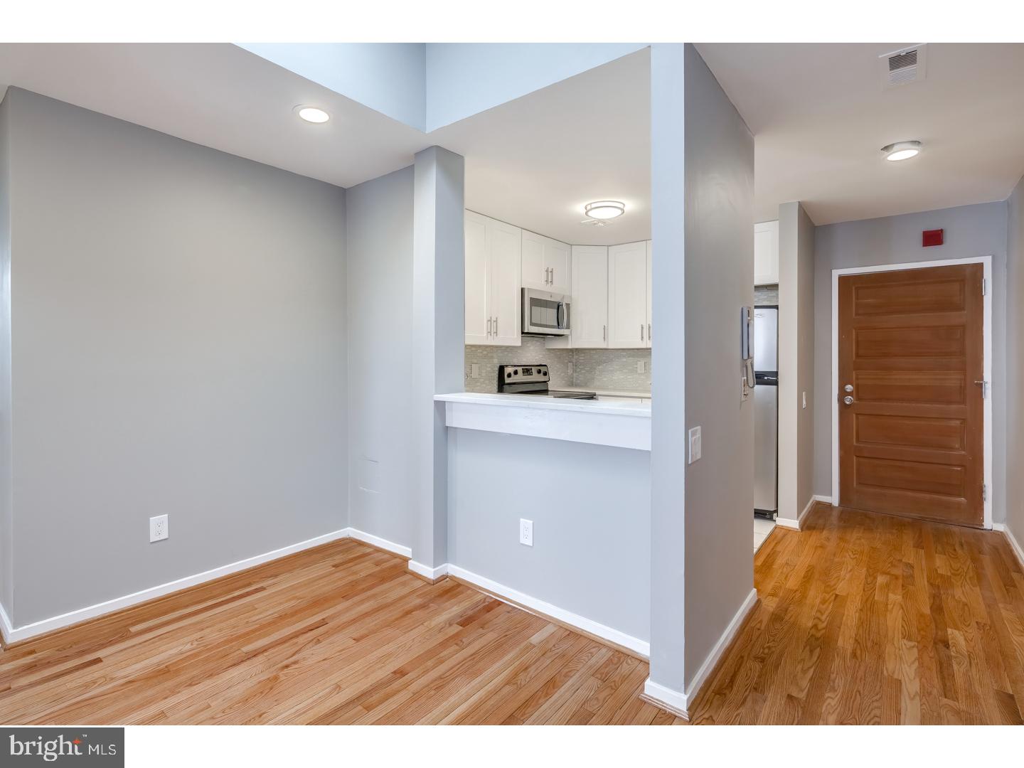 12-16 Letitia Street, Unit 503 Philadelphia, PA 19106 - Photo 7 of 12 a view of kitchen with wooden floor
