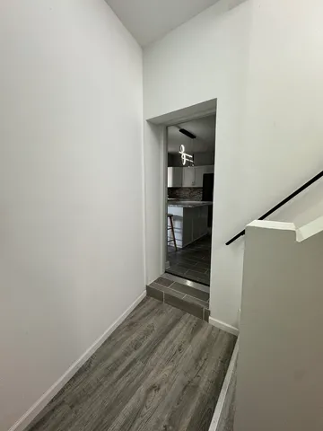 a view of an empty walk in closet