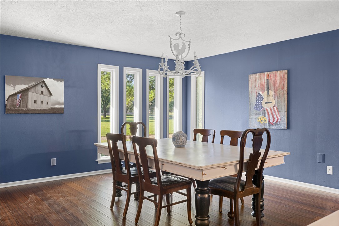 871 Cazey Loop Franklin, TX 77856 - Photo 19 of 42 a view of a dining room with furniture window and outside view