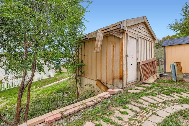 a house with trees in front of it