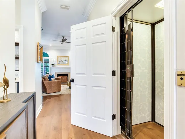 a kitchen with granite countertop white cabinets and appliances