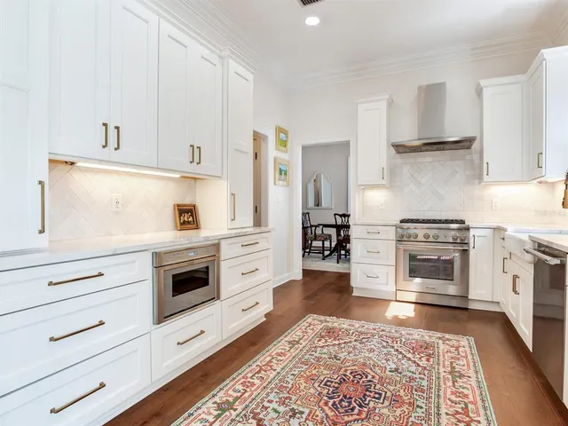 a view of a hallway with a room