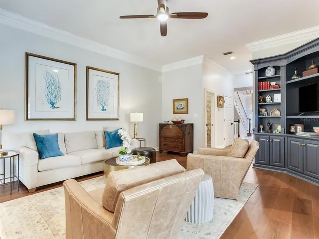 a bedroom with a large bed and a couch