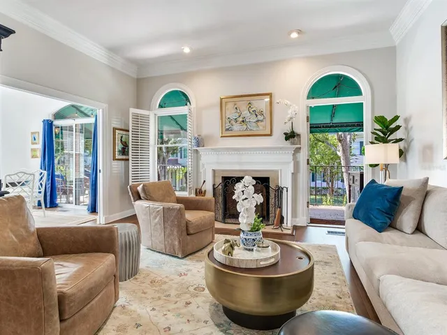 a bedroom with bed and a couch