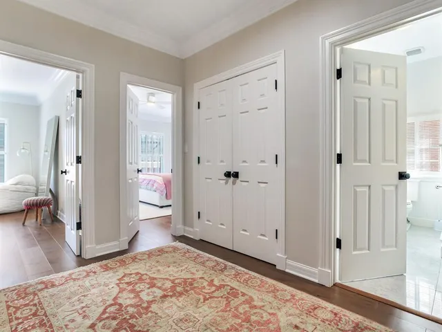 a bathroom with a shower sink and mirror