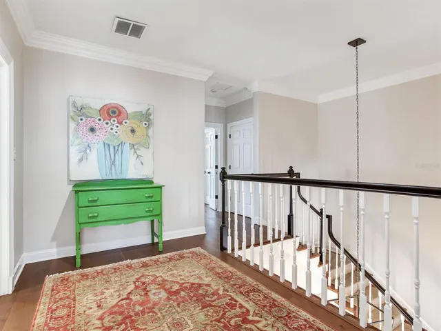 a view of a patio with a table chairs and a patio