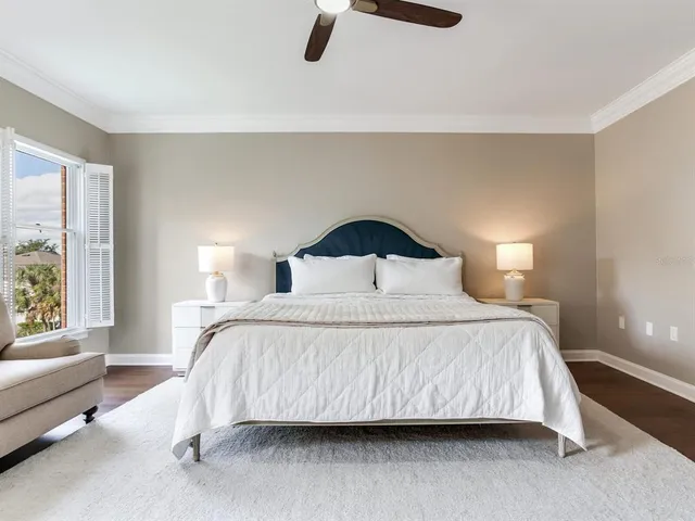 a front view of a house with a yard and a garage