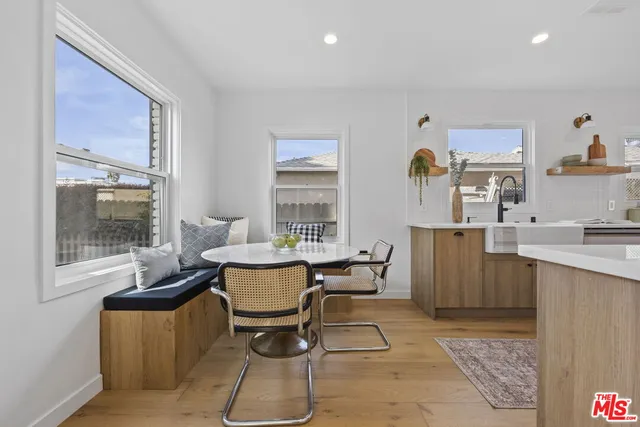 a workspace with furniture and window