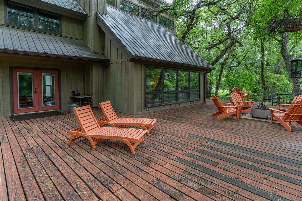 377 County Road 2530 Meridian, TX 76665 - Photo 11 of 25 a backyard of a house with seating space
