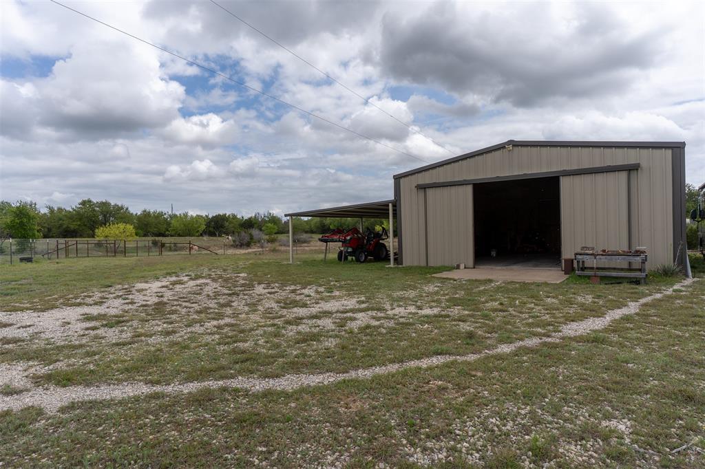 377 County Road 2530 Meridian, TX 76665 - Photo 20 of 25 a view of a house with a yard