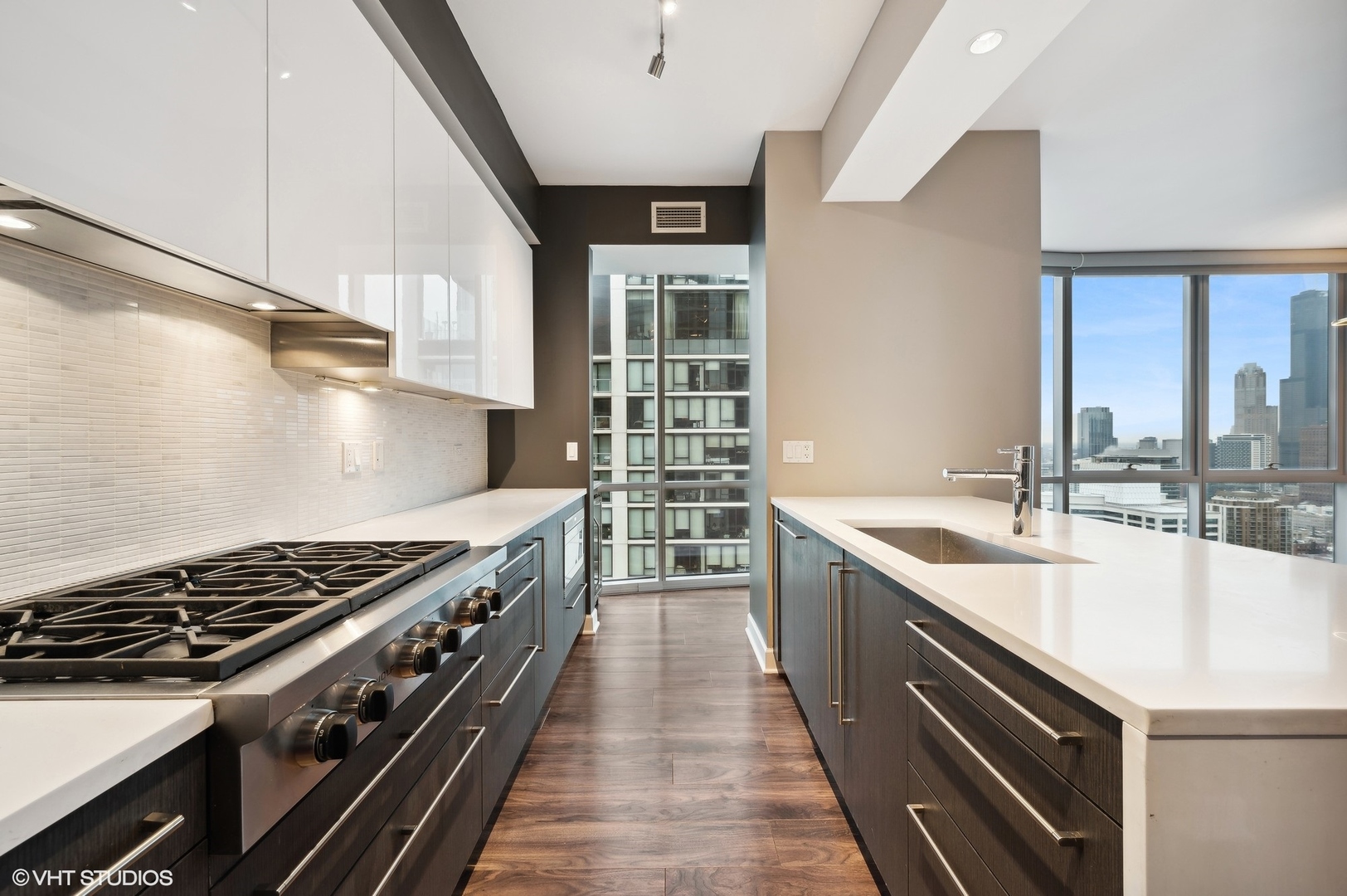 1201 South Prairie Avenue, Unit 4501 Chicago, IL 60605 - Photo 14 of 52 a kitchen with a stove and a sink