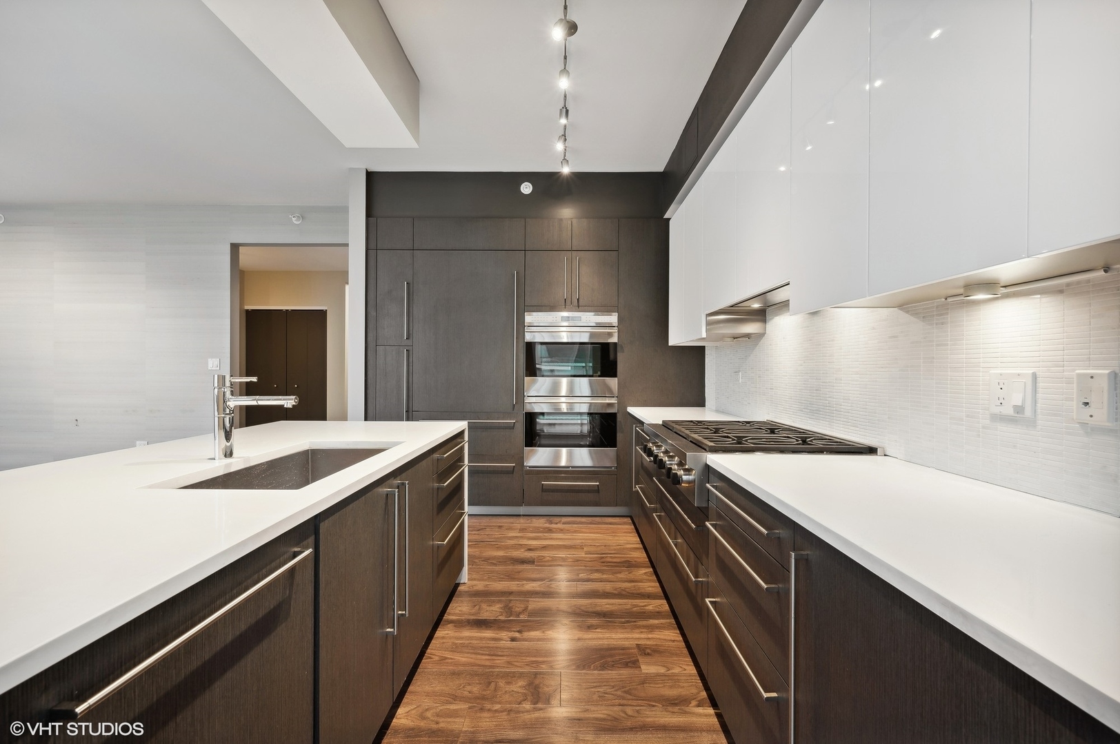 1201 South Prairie Avenue, Unit 4501 Chicago, IL 60605 - Photo 15 of 52 a large kitchen with stainless steel appliances a sink and stove