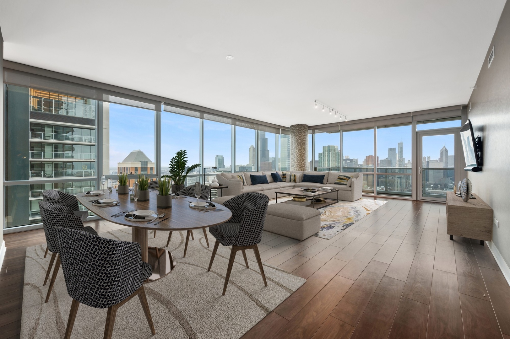 1201 South Prairie Avenue, Unit 4501 Chicago, IL 60605 - Photo 3 of 52 a view of a dining room with furniture window and wooden floor