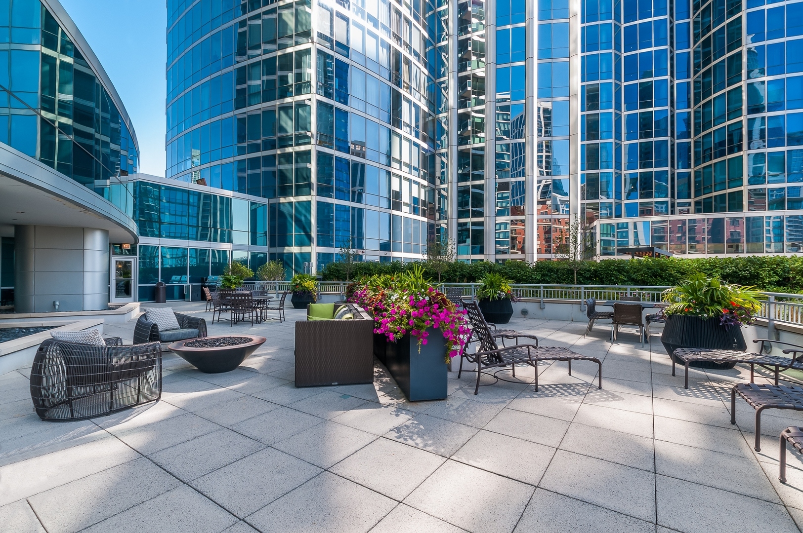 1201 South Prairie Avenue, Unit 4501 Chicago, IL 60605 - Photo 40 of 52 a view of a patio with couches and potted plants