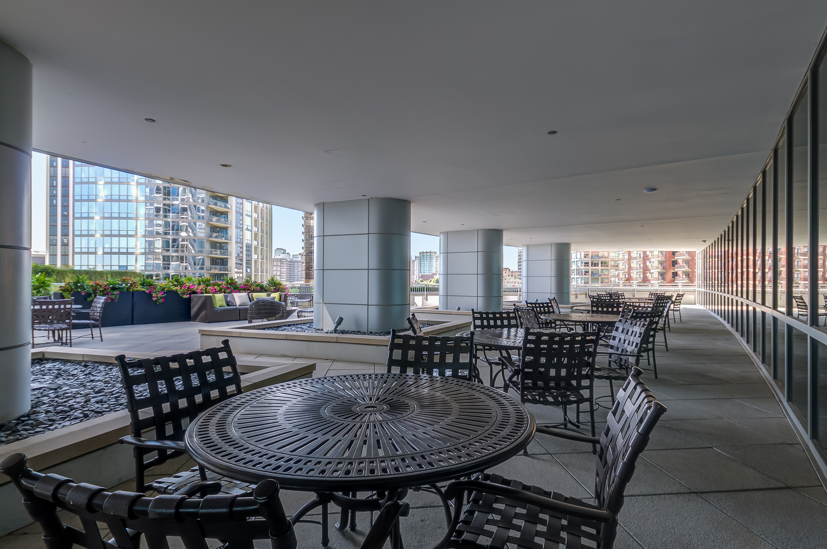 1201 South Prairie Avenue, Unit 4501 Chicago, IL 60605 - Photo 42 of 52 a dining room with furniture a rug and a floor to ceiling window