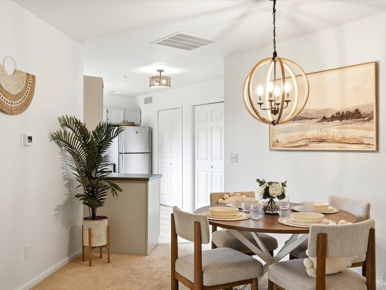 4945 Twin Lakes Road, Unit 46 Boulder, CO 80301 - Photo 16 of 42 Designer lighting and an open layout create a bright, welcoming atmosphere for everyday living.