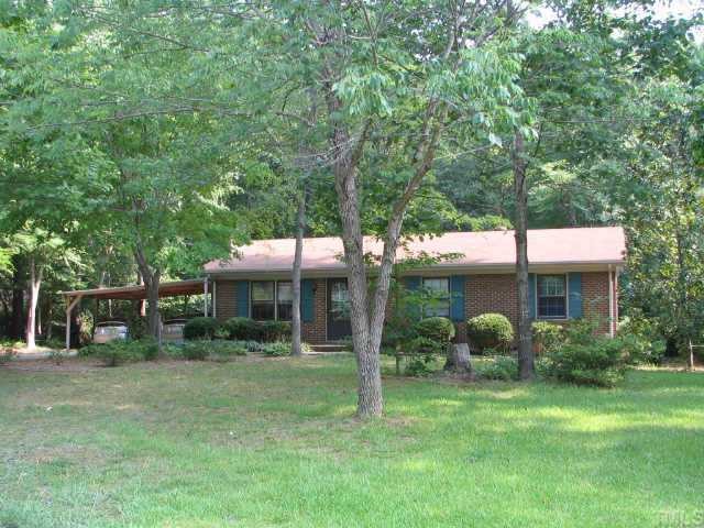 1710 Cranston Road Garner, NC 27529 - Photo 1 of 7 a view of a house with a backyard