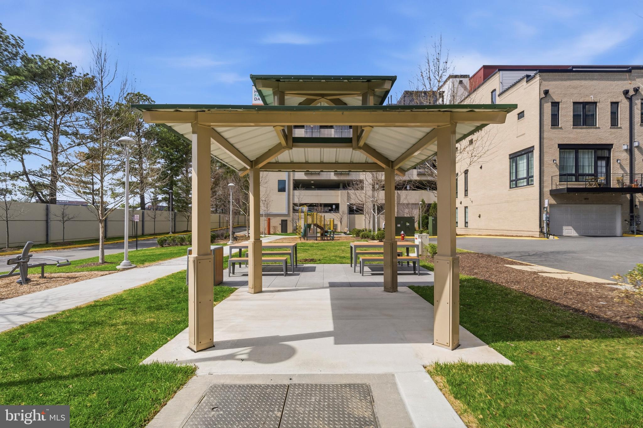 1878 Easterly Road Reston, VA 20190 - Photo 40 of 63 a view of a patio with a table and chairs
