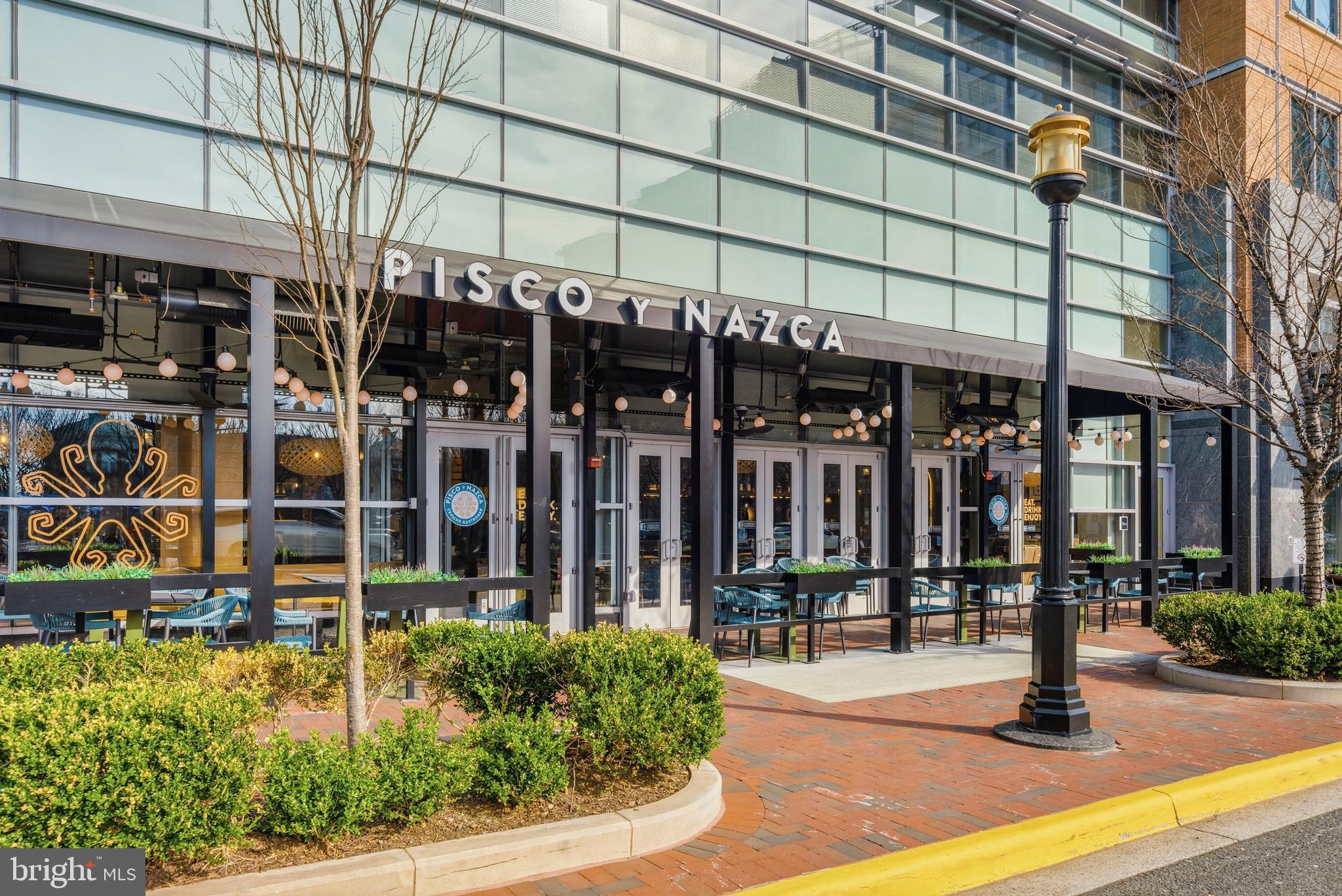 1878 Easterly Road Reston, VA 20190 - Photo 45 of 63 front view of a building with a garden