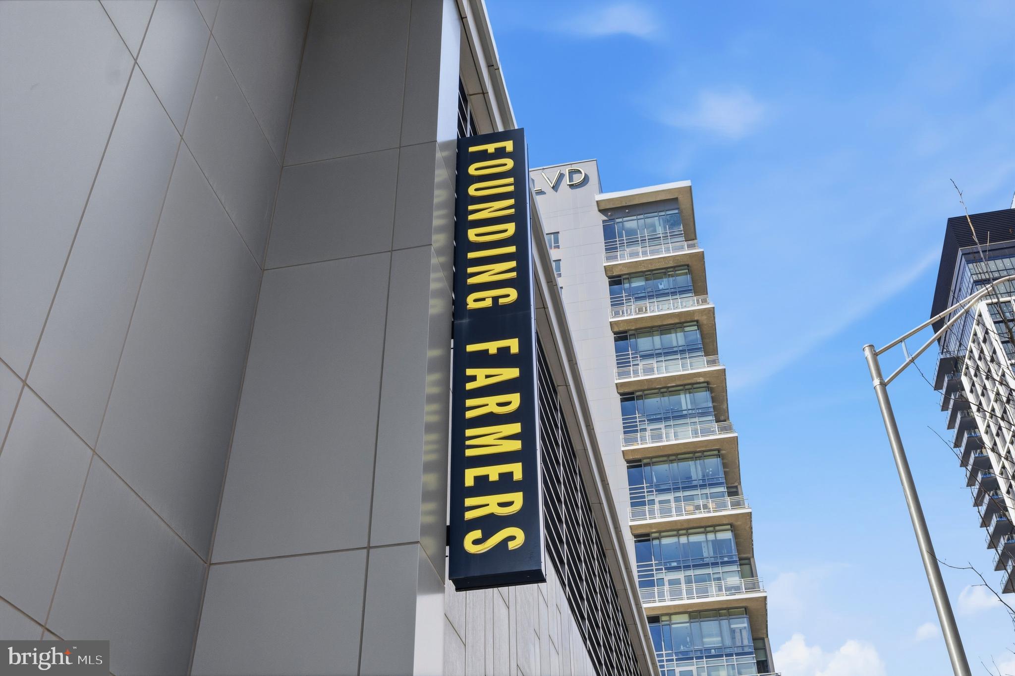 1878 Easterly Road Reston, VA 20190 - Photo 51 of 63 a view of an empty room with stairs and wooden floor
